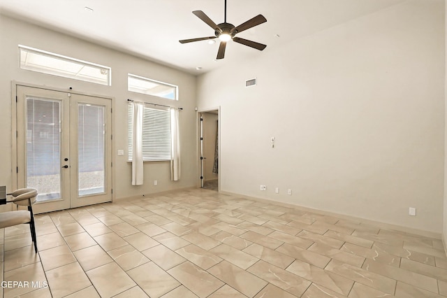 14512 Dominic Azcarate Dr, El Paso, TX 79938 - unfurnished room with french doors, a ceiling fan, and light tile patterned flooring