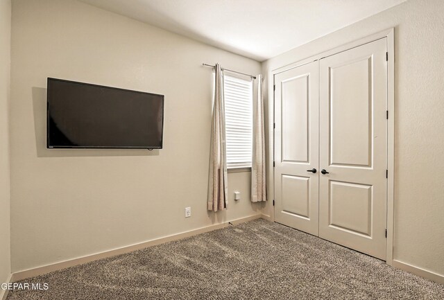 14512 Dominic Azcarate Dr, El Paso, TX 79938 - unfurnished bedroom with carpet and a closet