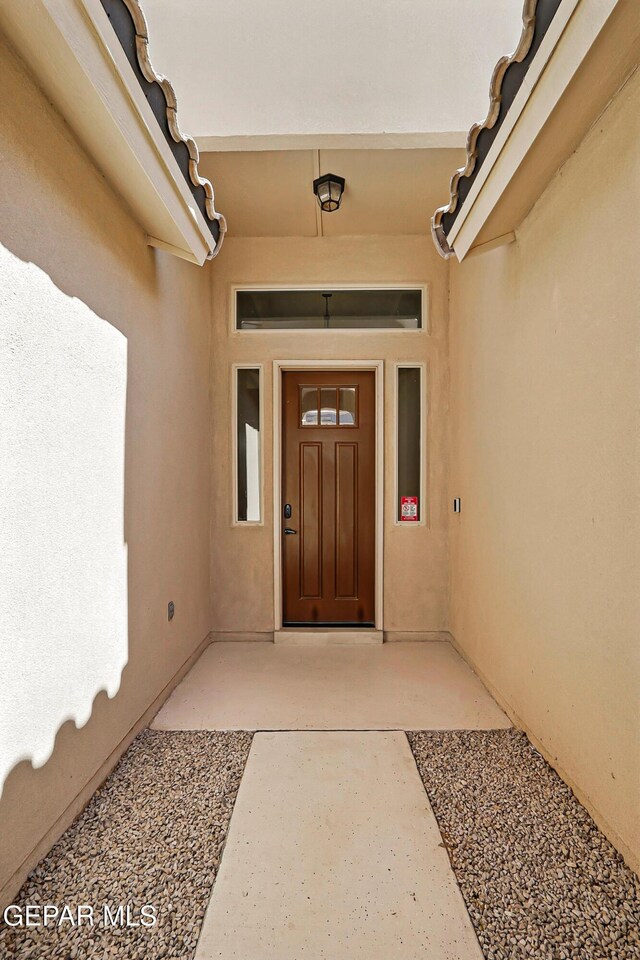14512 Dominic Azcarate Dr, El Paso, TX 79938 - property entrance with stucco siding