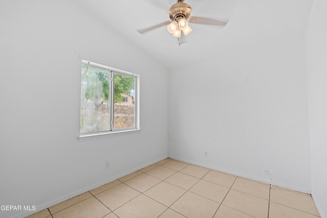 12290 Tierra Bella Dr, El Paso, TX 79938 - empty room featuring vaulted ceiling, a ceiling fan, and light tile patterned flooring