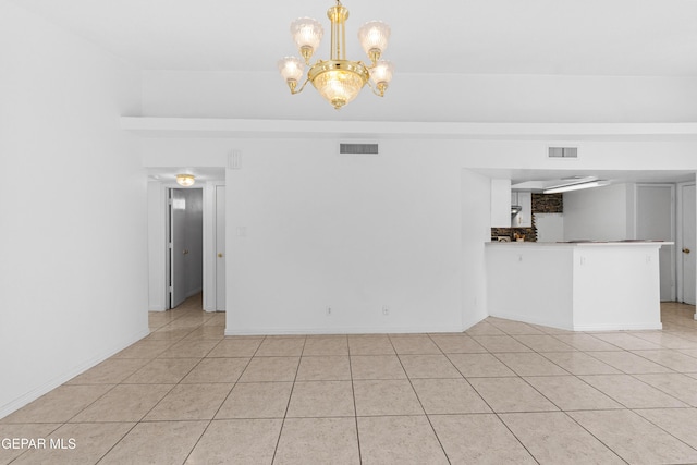 12290 Tierra Bella Dr, El Paso, TX 79938 - unfurnished living room featuring light tile patterned flooring and a chandelier