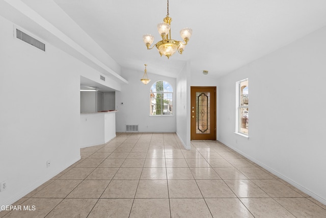 12290 Tierra Bella Dr, El Paso, TX 79938 - tiled foyer with a chandelier and baseboards