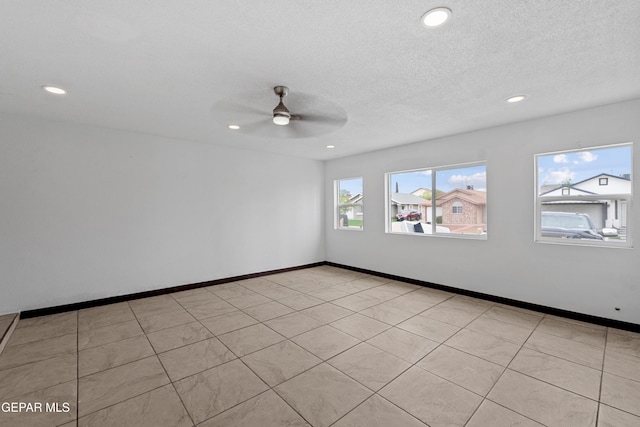 12290 Tierra Bella Dr, El Paso, TX 79938 - empty room featuring a ceiling fan, recessed lighting, and a textured ceiling