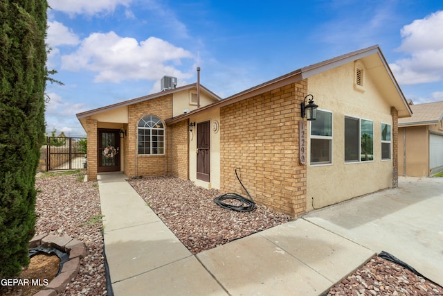 12290 Tierra Bella Dr, El Paso, TX 79938 - view of front of property featuring stucco siding and brick siding