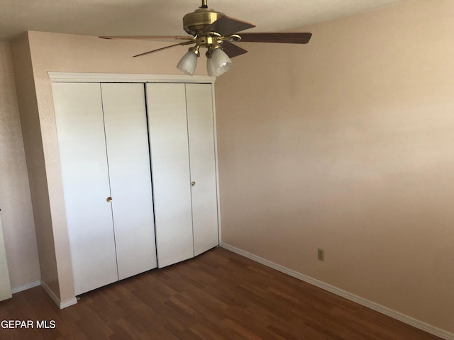 10309 Woodruff Ct, El Paso, TX 79925 - unfurnished bedroom with wood finished floors, a closet, and a ceiling fan