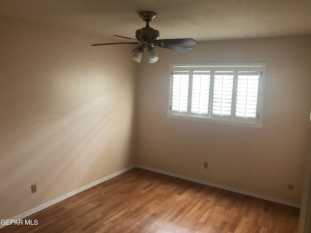 10309 Woodruff Ct, El Paso, TX 79925 - spare room with wood finished floors and ceiling fan