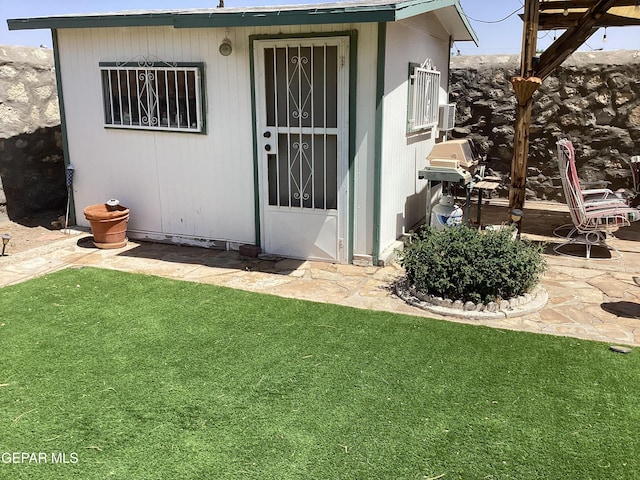 10309 Woodruff Ct, El Paso, TX 79925 - doorway to property featuring a lawn