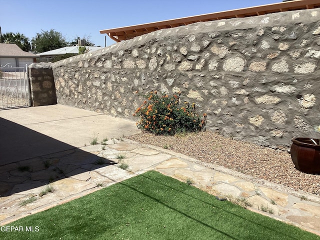 10309 Woodruff Ct, El Paso, TX 79925 - view of patio / terrace featuring a gate