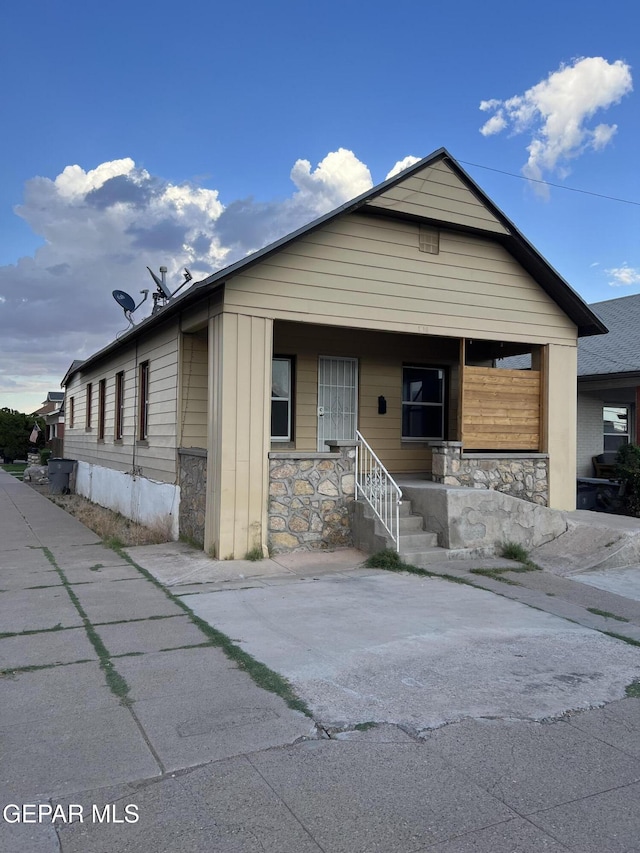 1118 N Laurel St, El Paso, TX 79902 - view of front of property featuring covered porch and stone siding