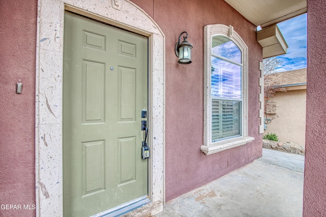11813 Deer Grass Cir, El Paso, TX 79936 - view of exterior entry featuring stucco siding