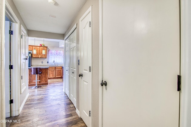 11813 Deer Grass Cir, El Paso, TX 79936 - hall featuring wood finished floors