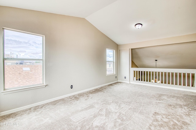 11813 Deer Grass Cir, El Paso, TX 79936 - carpeted empty room featuring lofted ceiling and baseboards