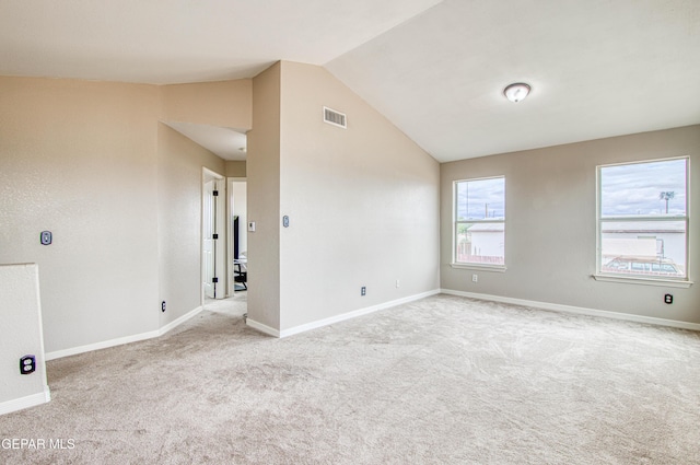 11813 Deer Grass Cir, El Paso, TX 79936 - empty room with carpet flooring and lofted ceiling