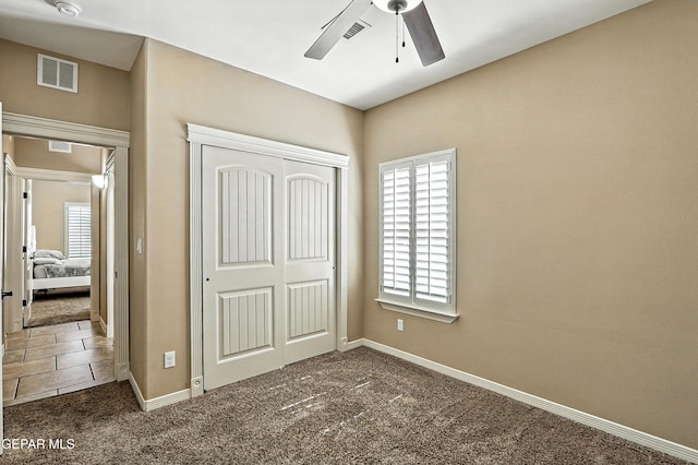 14552 Long Shadow Ave, El Paso, TX 79938 - unfurnished bedroom featuring carpet, a closet, and ceiling fan