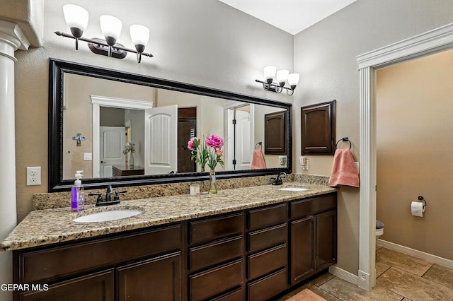 14552 Long Shadow Ave, El Paso, TX 79938 - bathroom with double vanity and tile patterned flooring