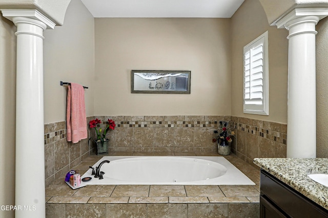 14552 Long Shadow Ave, El Paso, TX 79938 - bathroom featuring decorative columns, a garden tub, and vanity