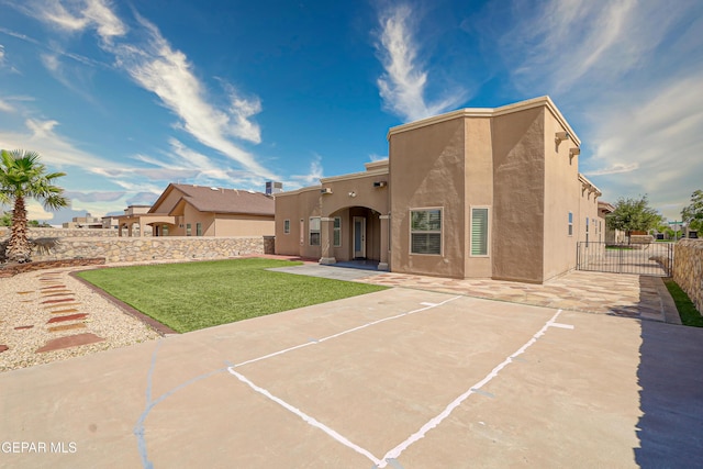14552 Long Shadow Ave, El Paso, TX 79938 - rear view of house featuring stucco siding and a patio area
