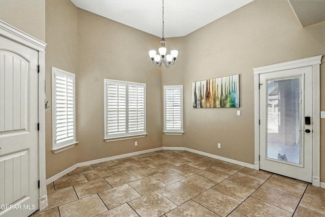 14552 Long Shadow Ave, El Paso, TX 79938 - foyer featuring a high ceiling, a chandelier, and healthy amount of natural light