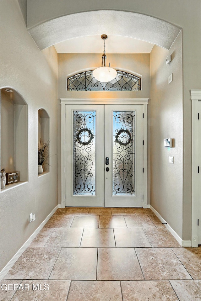 14552 Long Shadow Ave, El Paso, TX 79938 - foyer featuring arched walkways and french doors