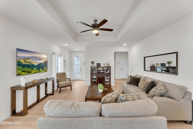 11157 Blazing Star Pl, El Paso, TX 79934 - living room featuring recessed lighting, ceiling fan, a tray ceiling, and light wood finished floors