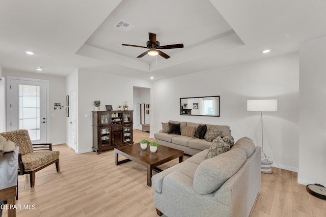 11157 Blazing Star Pl, El Paso, TX 79934 - living room with a tray ceiling, ceiling fan, light wood-style floors, and recessed lighting