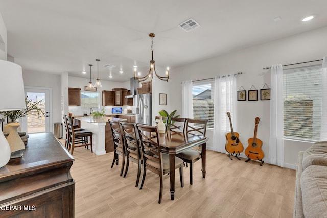 11157 Blazing Star Pl, El Paso, TX 79934 - dining space featuring plenty of natural light, light wood-style flooring, and recessed lighting