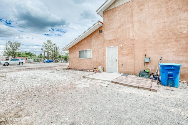 11581 Valle Verde Rd, Socorro, TX 79927 - rear view of property with stucco siding