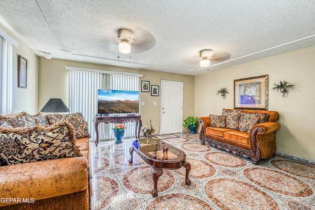 11581 Valle Verde Rd, Socorro, TX 79927 - living room featuring a textured ceiling and a ceiling fan
