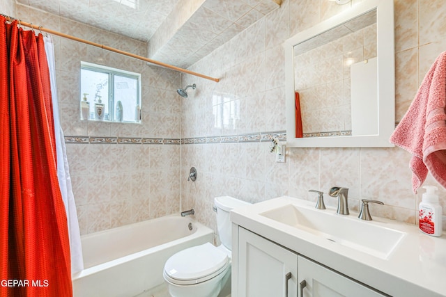 11581 Valle Verde Rd, Socorro, TX 79927 - bathroom with tile walls, shower / bathtub combination with curtain, and vanity