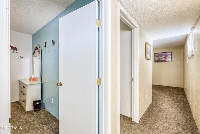11581 Valle Verde Rd, Socorro, TX 79927 - corridor with a textured ceiling and carpet floors