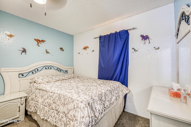 11581 Valle Verde Rd, Socorro, TX 79927 - bedroom featuring carpet flooring, a textured ceiling, and a ceiling fan