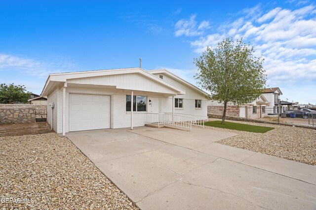 205 Caribe Cir, El Paso, TX 79927 - view of front of house with brick siding and a garage