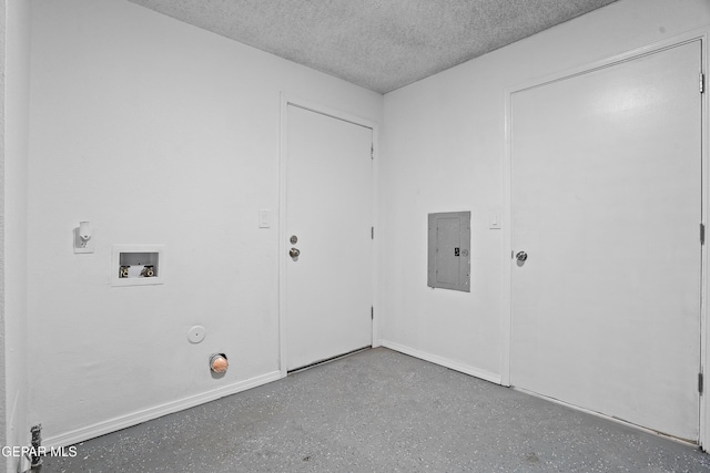 205 Caribe Cir, El Paso, TX 79927 - laundry area with electric panel, a textured ceiling, and hookup for a washing machine