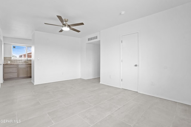 205 Caribe Cir, El Paso, TX 79927 - unfurnished bedroom with ensuite bath and ceiling fan
