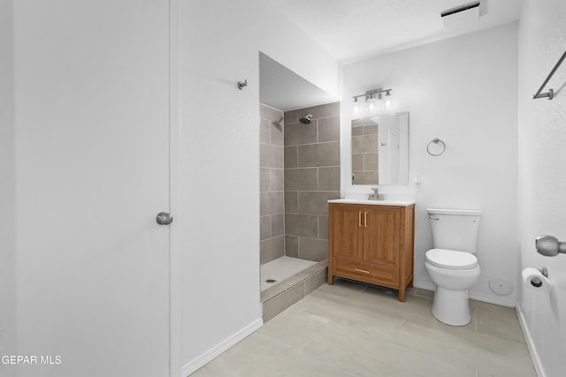 205 Caribe Cir, El Paso, TX 79927 - bathroom with tiled shower, vanity, and tile patterned floors