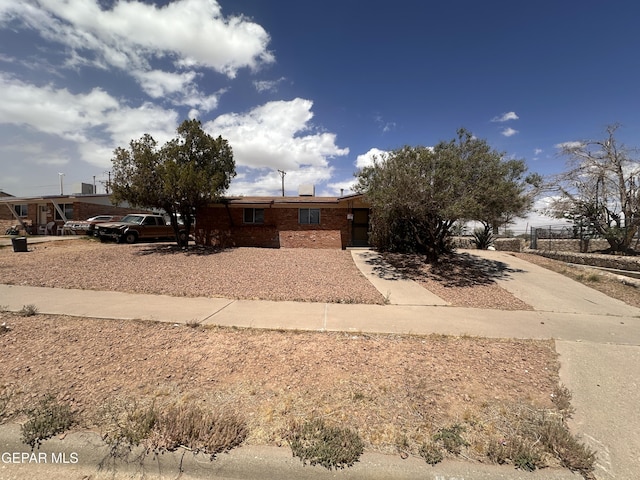 5013 Winthrop Dr, El Paso, TX 79924 - view of front of home featuring brick siding and concrete driveway