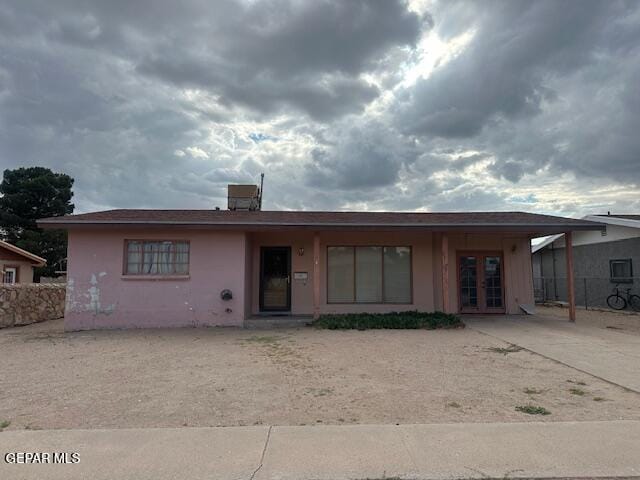 1137 Cimarron St, El Paso, TX 79915 - ranch-style house featuring french doors and stucco siding