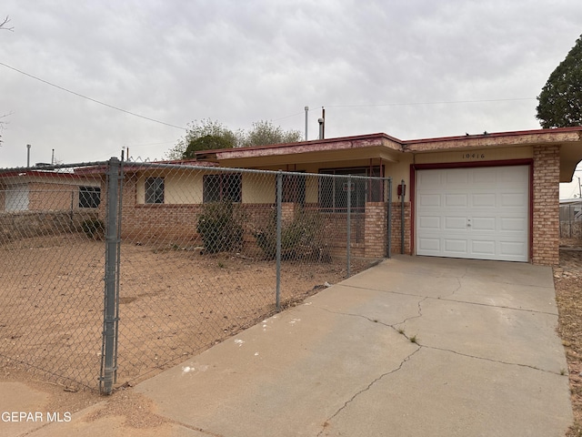 10416 Triumph Dr, El Paso, TX 79924 - ranch-style home featuring brick siding, driveway, and a garage