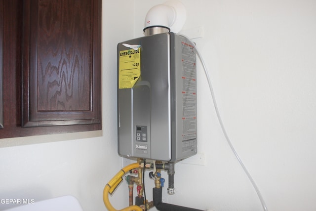 1374 Gusart Ave, El Paso, TX 79928 - utility room with tankless water heater