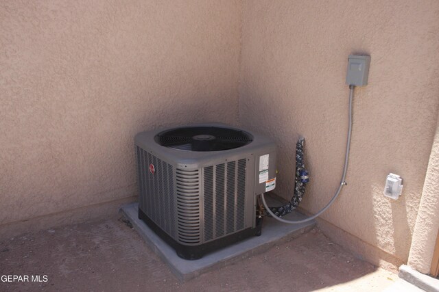 1374 Gusart Ave, El Paso, TX 79928 - exterior view of a cooling unit and stucco siding