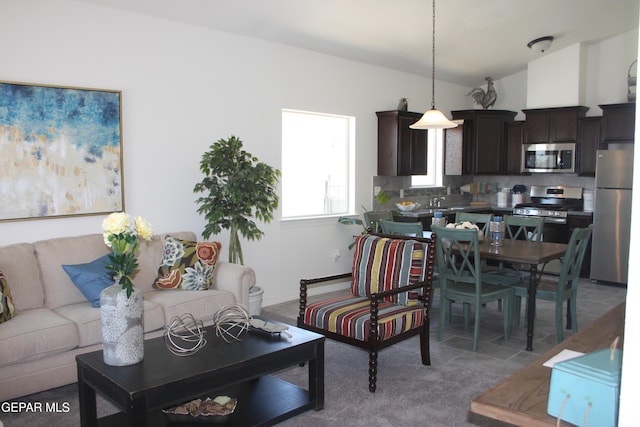 1374 Gusart Ave, El Paso, TX 79928 - living room with vaulted ceiling and carpet flooring