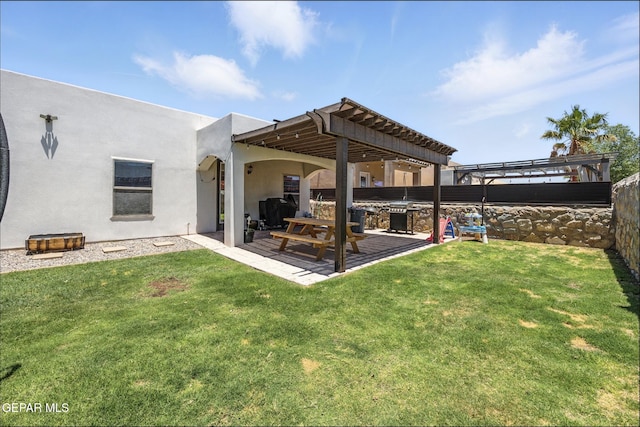 14516 Jesus Almeida, El Paso, TX 79938 - back of house featuring a fenced backyard, a pergola, stucco siding, and a patio area