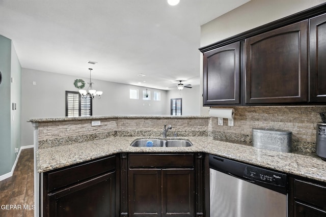 14516 Jesus Almeida, El Paso, TX 79938 - kitchen featuring stainless steel dishwasher, dark brown cabinets, dark wood-style floors, ceiling fan, and backsplash