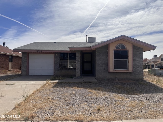 10900 Joe Dimaggio Cir, El Paso, TX 79934 - ranch-style home featuring a garage, concrete driveway, and brick siding