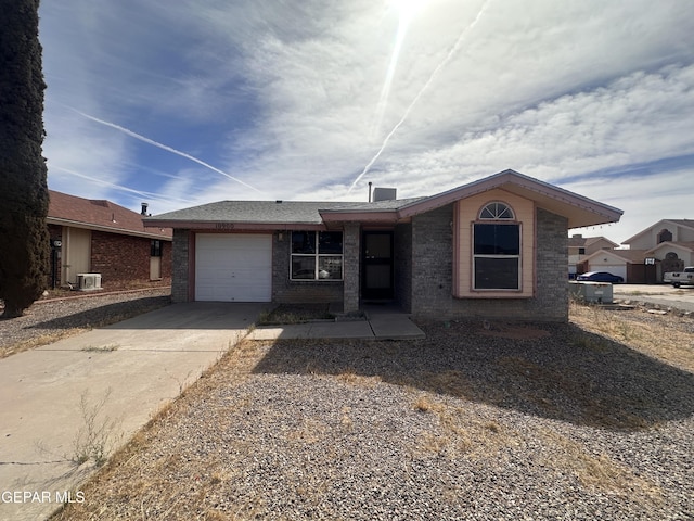 10900 Joe Dimaggio Cir, El Paso, TX 79934 - ranch-style home featuring an attached garage, concrete driveway, and brick siding