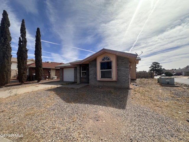 10900 Joe Dimaggio Cir, El Paso, TX 79934 - single story home with driveway, a garage, and brick siding