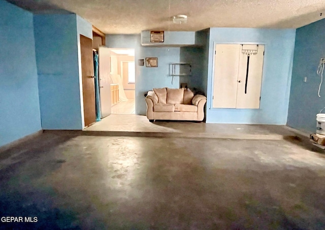 1611 James Chisum Dr, El Paso, TX 79936 - living area with a textured ceiling