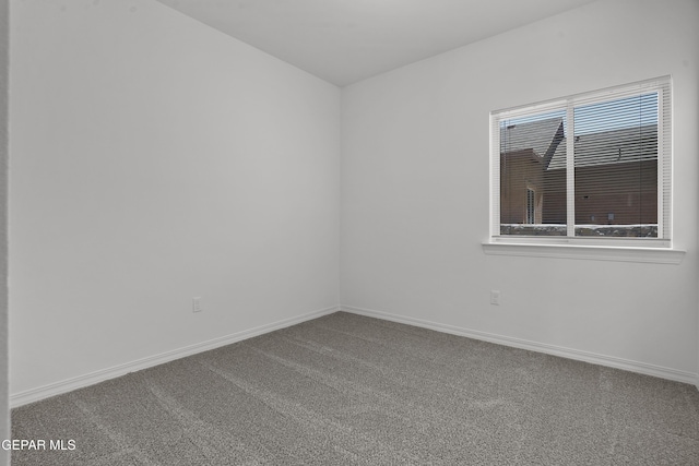 2301 Tony Harper St, El Paso, TX 79938 - carpeted empty room with baseboards