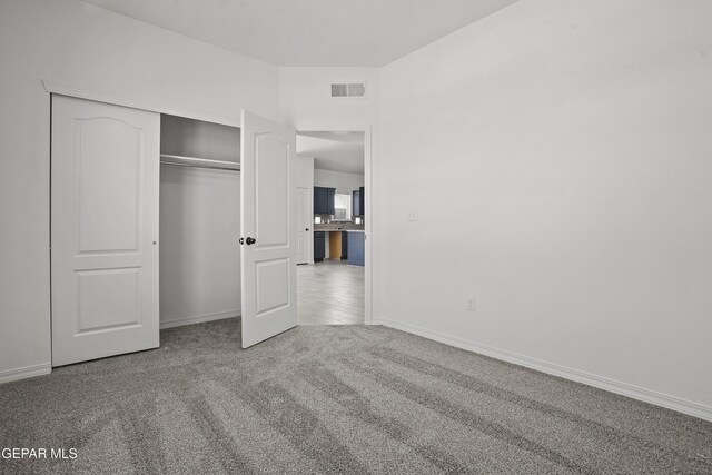 2301 Tony Harper St, El Paso, TX 79938 - unfurnished bedroom with carpet and a closet