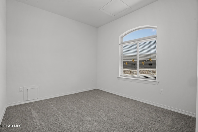 2301 Tony Harper St, El Paso, TX 79938 - carpeted spare room with attic access and baseboards